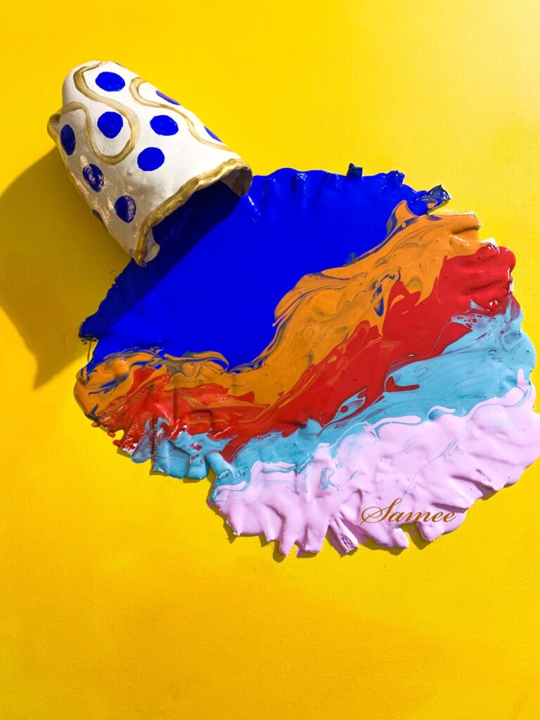 Colorful paint palette and brushes representing creative art classes
